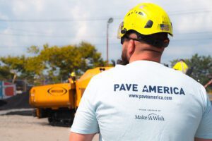 back of a major league milling employee wearing a pave america & make-a-wish partnership t-shirt